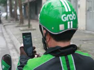 Grab tăng giá cước bù thuế VAT